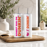Two Personalized Name Tumblers – Custom Dunkin Style Insulated Cups with Straw featuring bright pink and orange text on a white background, displayed on a wooden tray in a modern kitchen setting.